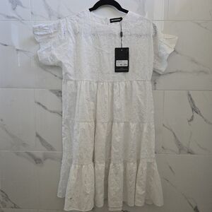 PrettyLittleThing: White Eyelet Baby Doll Dress